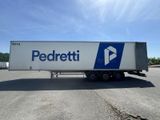 a semi truck that is parked in a parking lot
