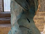 a sculpture of a bird on display in a museum