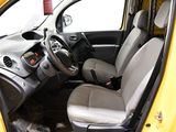 a small yellow car with a steering wheel and a dashboard