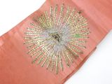 a close up of a piece of fabric with a flower design on it