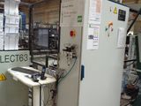 a machine that is sitting in a building with a lot of papers