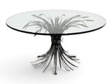 an image of a glass table with a metal base and a glass top