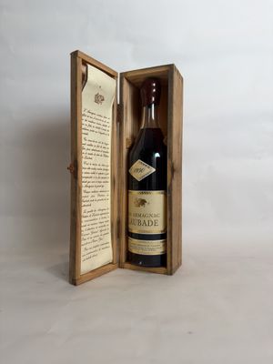 an open wooden box with a bottle of wine inside of it