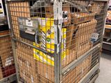 a large metal cart with a lot of items in it