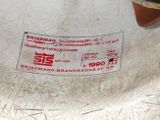 a picture of a close up of a label on a piece of metal
