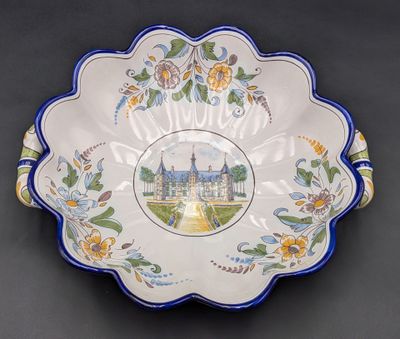 a bowl with a picture of a castle on it