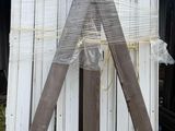 a pile of wooden boards stacked on top of each other