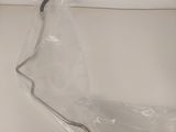 a clear glass bowl sitting on a white table
