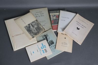 a lot of books that are sitting on a table