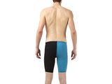the man in the blue and black swim trunks is looking back