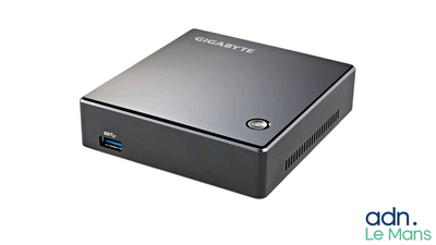 an image of a small computer with a usb drive attached to it