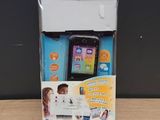 a box with a phone inside of it on a table
