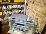 an image of a home library with a television and dvd player