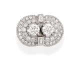 une bague Art déco sertie d'un diamant, signée Van Cleef