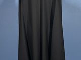 a black cape on a mannequin mannequin mannequin mannequin mannequin mannequin mannequin mannequin mannequin