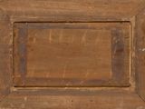 a picture of an old wooden picture frame on the wall