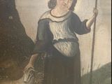 un vieux tableau représentant une femme avec une chèvre dans un champ