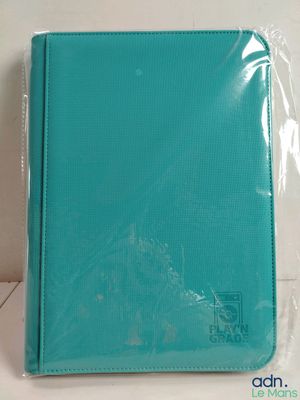 an image of a blue binder sitting on top of a white table