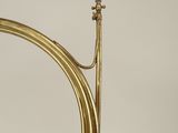 an image of a brass plated trumpet with a trumpet horn in the middle of it