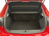 a red car with its trunk open on a white background