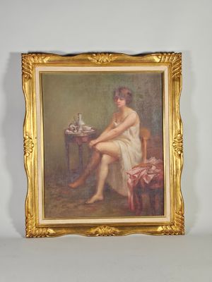 tableau représentant une femme en robe blanche assise à une table