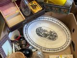 a box full of assorted items sitting on the floor