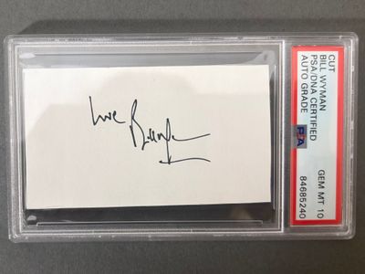 autographe signé sur une carte de baseball, présenté dans un étui en plastique transparent