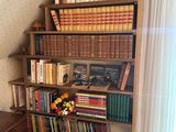 a bookshelf with a lot of books on it