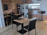 a dining room with a table and chairs in it