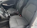 the interior of a car with the front seats folded down