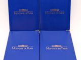 a couple of blue books sitting on top of each other