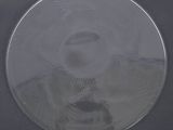 a glass plate with a picture of a man on it