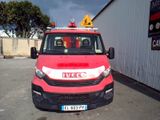 a picture of a red truck parked in a parking lot