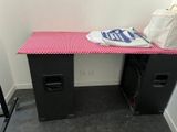 a bag sitting on top of a desk with a bag on it
