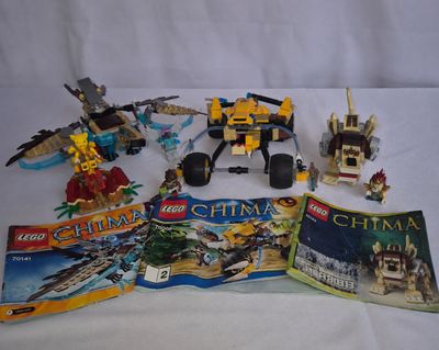 a lot of legos and books on the table
