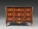 an antique chest of drawers with marble top