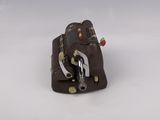 a small piece of luggage sitting on top of a white surface