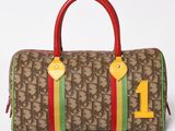 a close up of a handbag with a number on it
