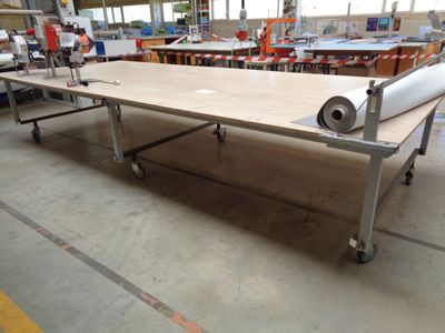 a long table with a roll of paper on it