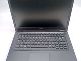 the dell laptop is open and ready to be used