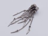 silver metal chain with spikes and chains hanging from it ' s ends