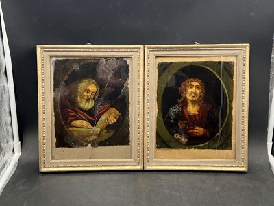 two framed paintings of a man and a woman holding a bowl