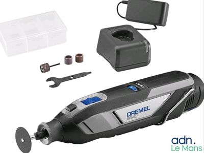 une image représentant un outil électrique noir et argenté contenant des outils