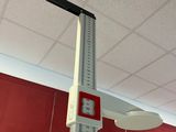 a large ruler that is hanging from the ceiling