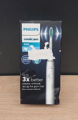 Brosse à dents électrique Philips Sonicare dans son emballage, posée sur une table en bois
