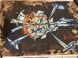 une photo d'une œuvre d'art posée sur une table