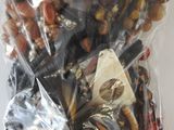 a bag of assorted beads and other items in it