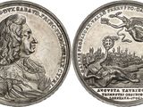 a close up of a silver coin with a woman on it