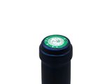 the bottle of wine is sitting on the table with a white background