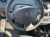 dashboard of a car with a steering wheel and dashboard controls